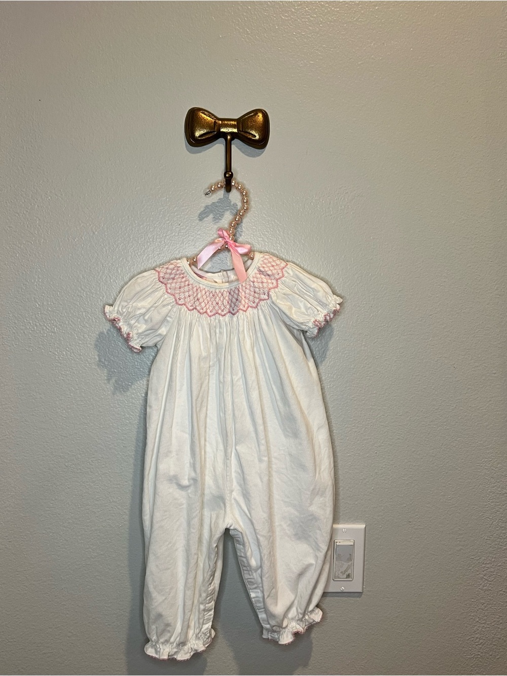 Petit Bebe Corduroy long romper with Pink Smocked Collar